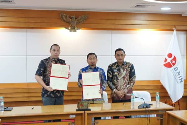 Walikota Parepare Tasming Hamid bersama Wakil Wali Kota Parepare, Hermanto Pasennangi menandatangani kerjasama dengan BRIN